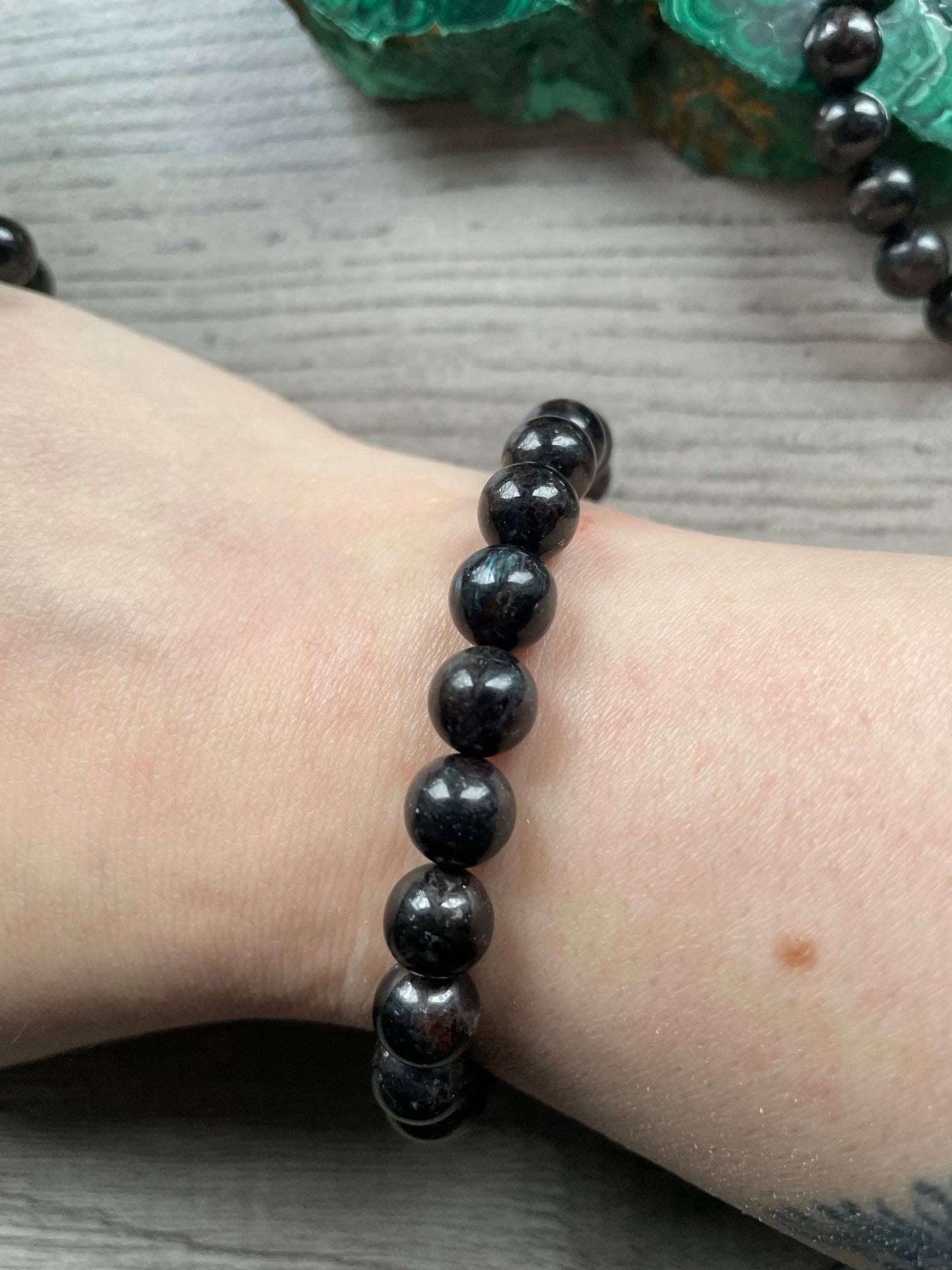 Arfvedsonite Bracelet 8mm - The Wandering Fox Emporium, Your Crystal Store close up