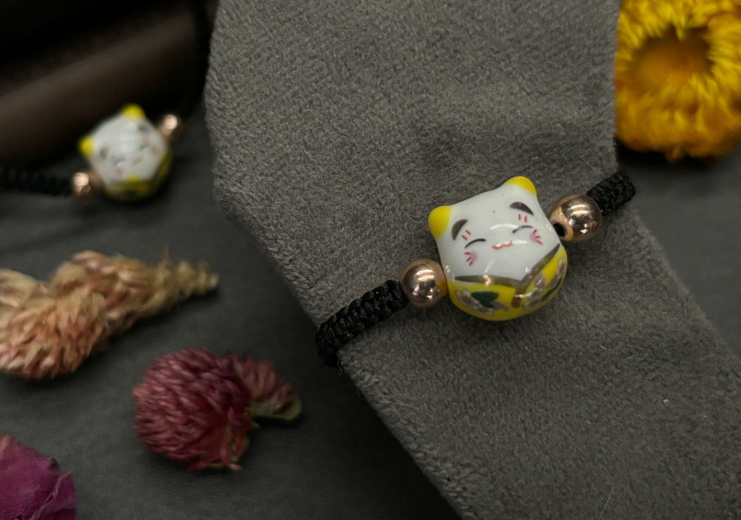 Yellow Maneki Neko "Lucky Cat" Bracelet (Twisted Nightshade Jewellery) close up