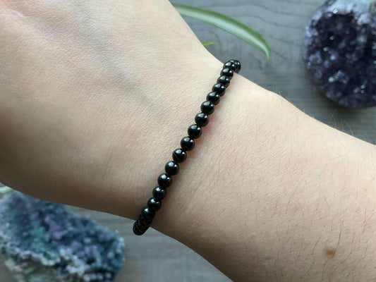 Black Tourmaline Bracelet 4mm - The Wandering Fox Emporium, Your Crystal Store close up