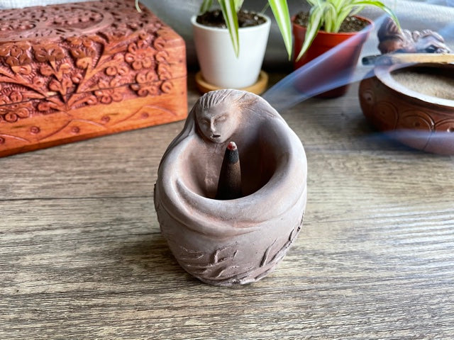 Pictured is an incense bowl or offering bowl carved out of gypsum in the shape of a goddess. Mother Spirit/Goddess Offering Bowl & Incense Holder example