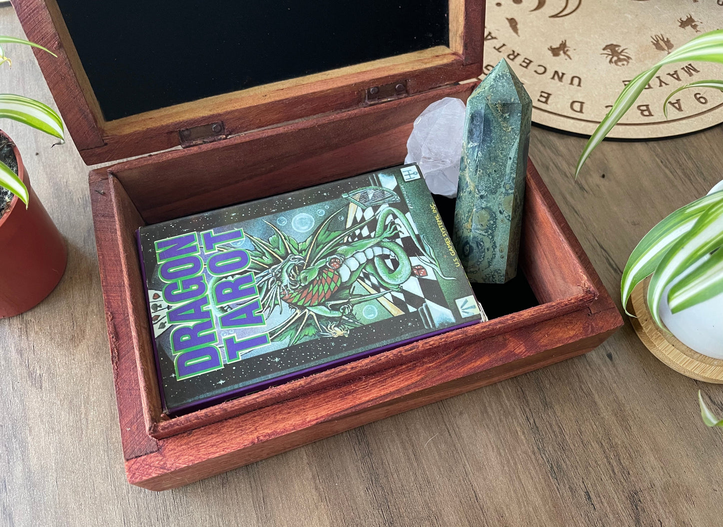 Pictured is hand-carved wood box with the pentacle symbol in the middle. Pentacle Carved Wooden Box open