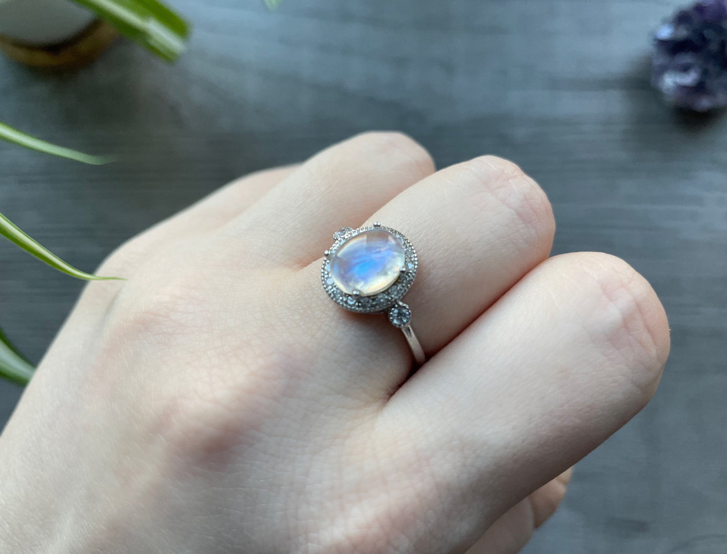 Pictured is a white moonstone gemstone set in an S925 sterling silver ring. White Moonstone S925 Sterling Silver Ring (F) - The Wandering Fox Emporium, Your Crystal Store side 2