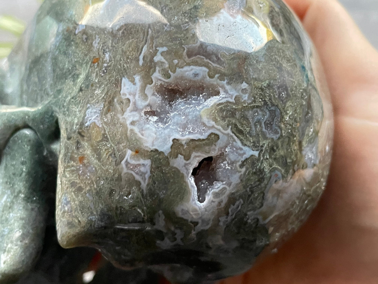Moss Agate Crystal Skull (1.15kg) - The Wandering Fox Emporium, Your Metaphysical Store close up