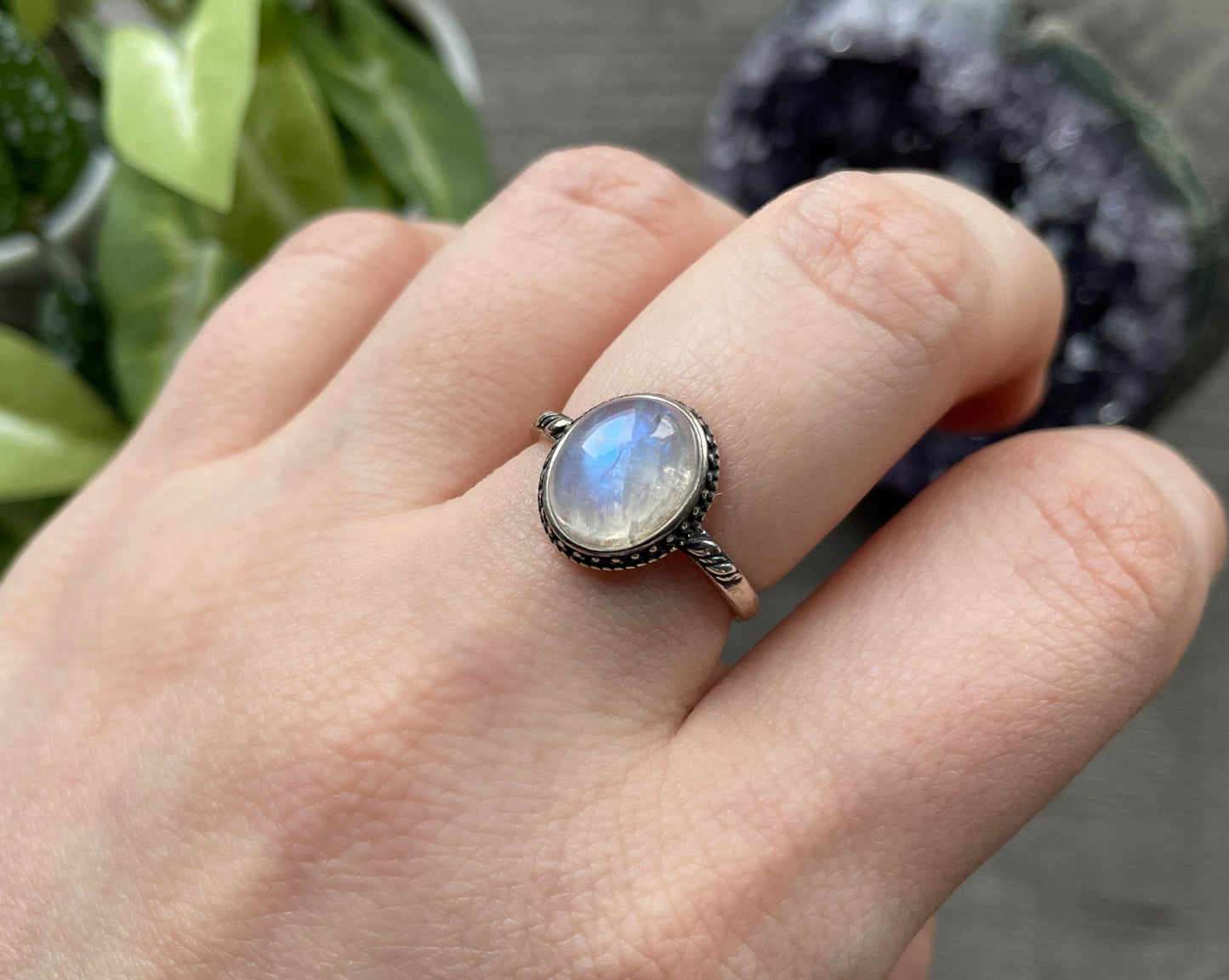 Pictured is a white moonstone gemstone set in an S925 sterling silver ring. White Moonstone S925 Sterling Silver Ring (J) - The Wandering Fox Emporium, Your Crystal Store side