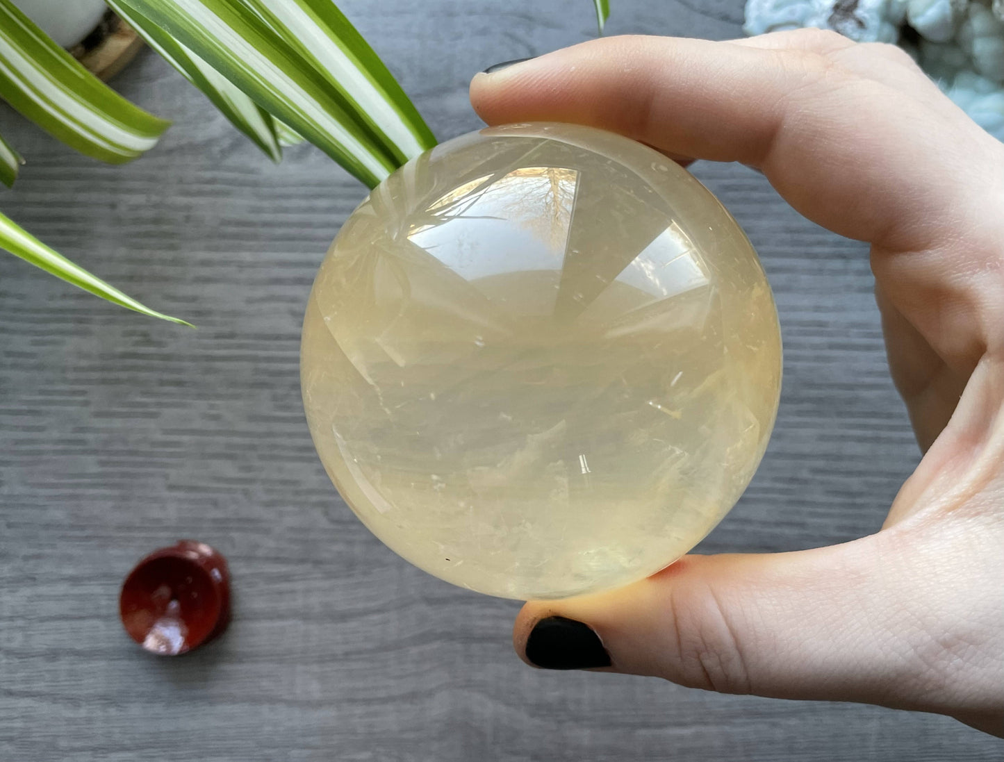Honey Calcite Sphere - 70mm (H) - The Wandering Fox Emporium, Your Crystal Store side 2