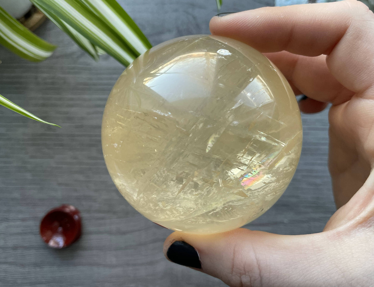 Honey Calcite Sphere - 70mm (H) - The Wandering Fox Emporium, Your Crystal Store front