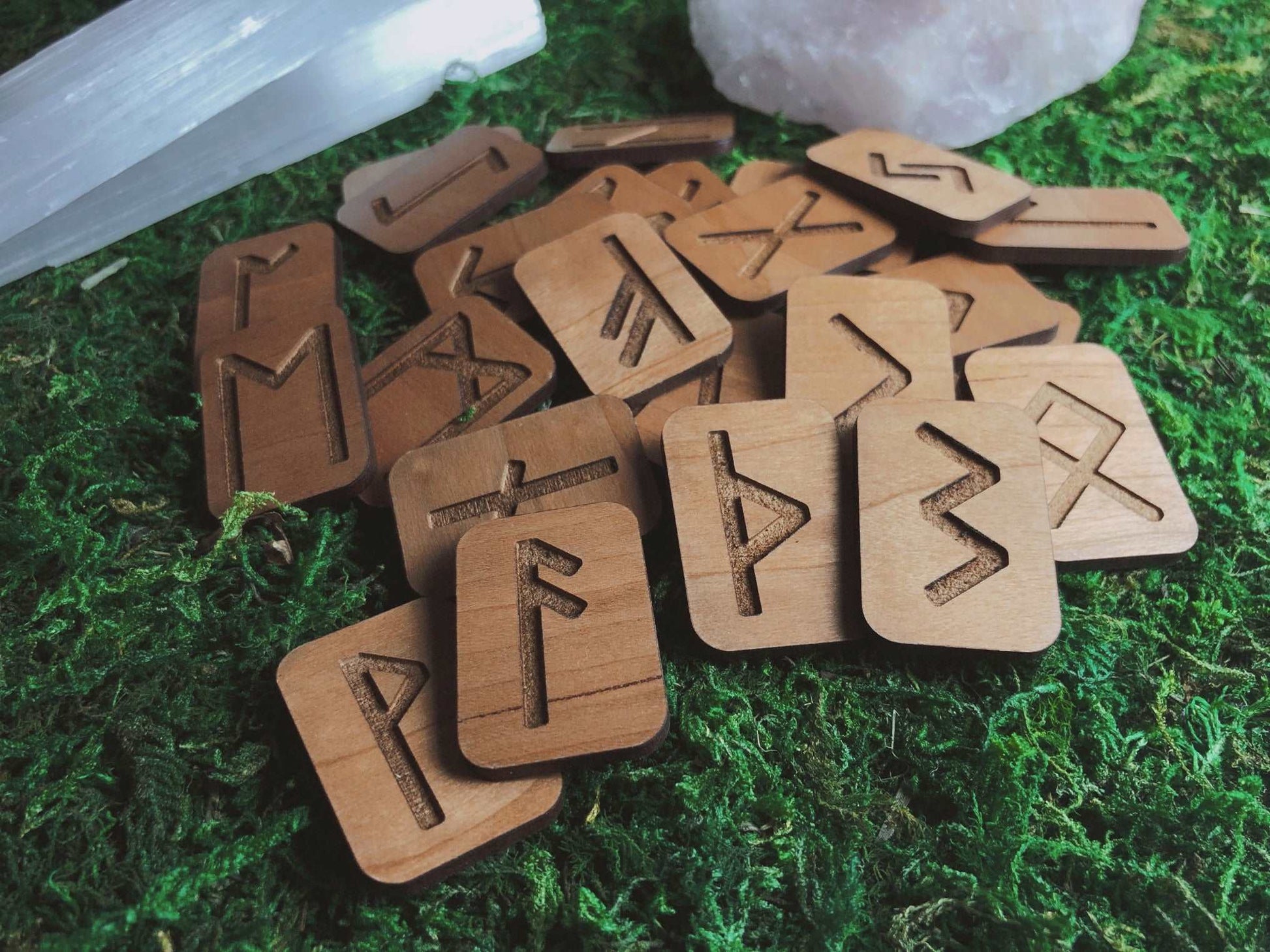 Pictured are handmade wood tile runes. Cherry Wood Elder Futhark Rune Set