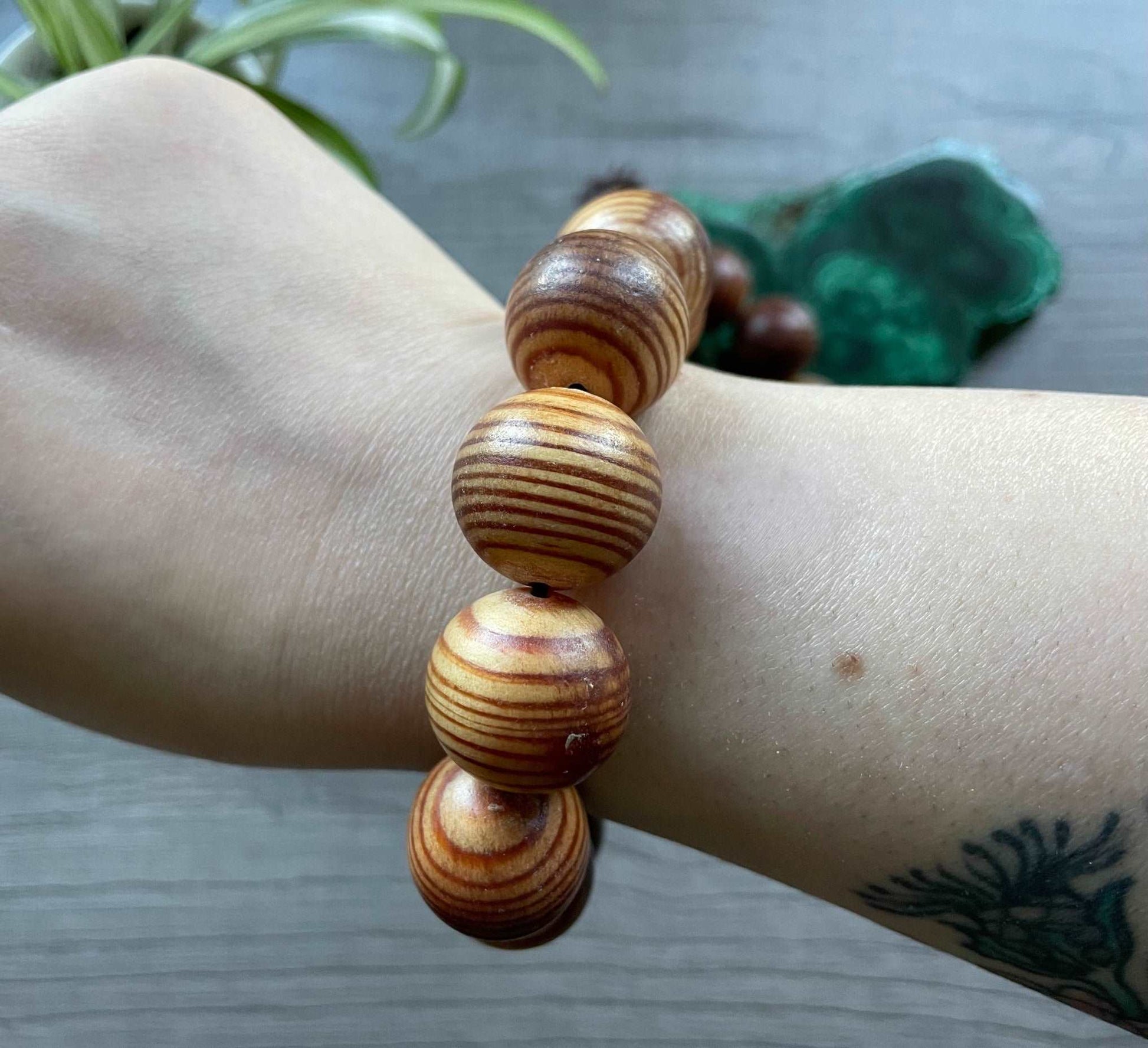 Buddhist Mala Wood Bead Bracelet (20mm) Tiger Wood close up