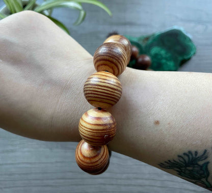 Buddhist Mala Wood Bead Bracelet (20mm) Tiger Wood close up