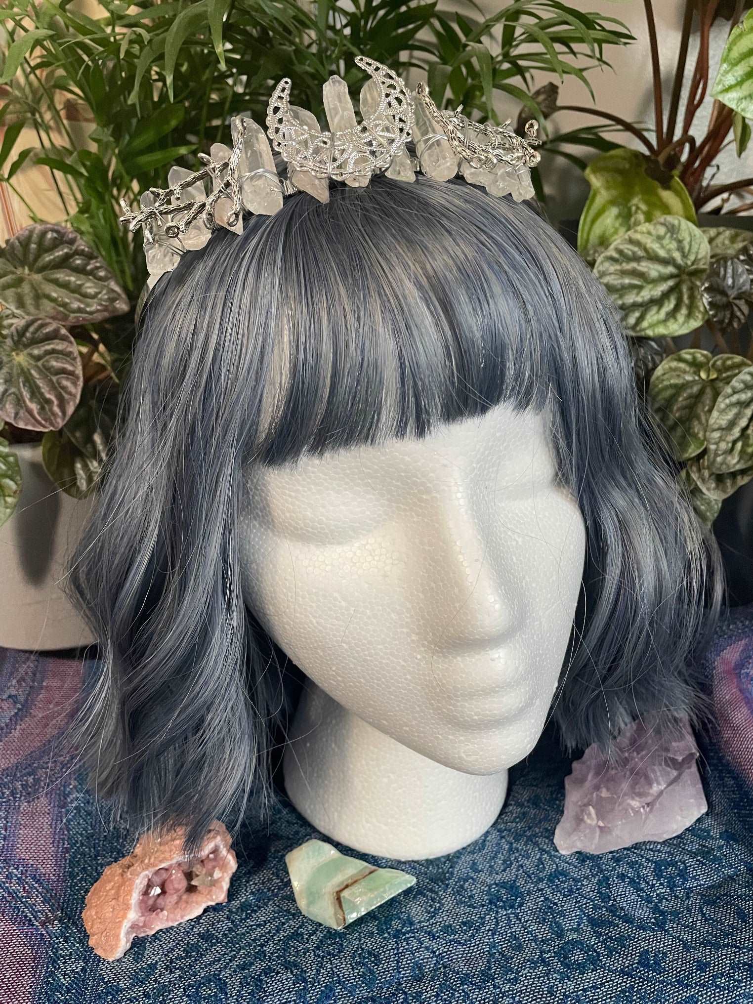 Pictured is a crown made with clear quartz points and a silver crescent moon. Clear Quartz Aura Crystal Crown - The Wandering Fox Emporium, Your Crystal Store on head