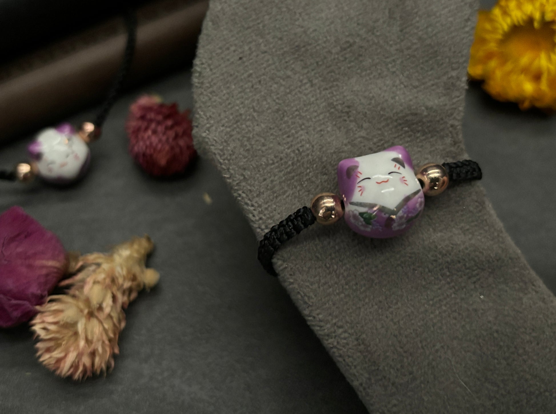 Purple Maneki Neko "Lucky Cat" Bracelet (Twisted Nightshade Jewellery) close up