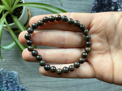 Bronzite Bracelet (6.5mm) - The Wandering Fox Emporium, Your Crystal Store close up