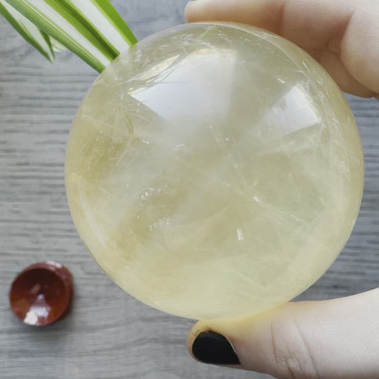 Honey Calcite Sphere - 77mm (E) - The Wandering Fox Emporium, Your Crystal Store video