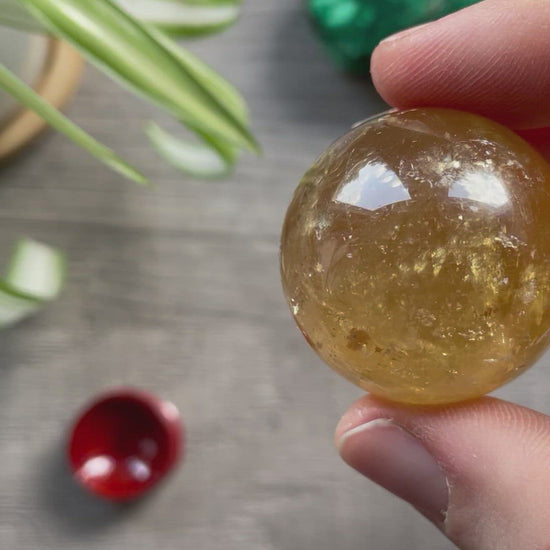 Honey Calcite Mini Sphere - 34mm (C) - The Wandering Fox Emporium, Your Crystal Store video