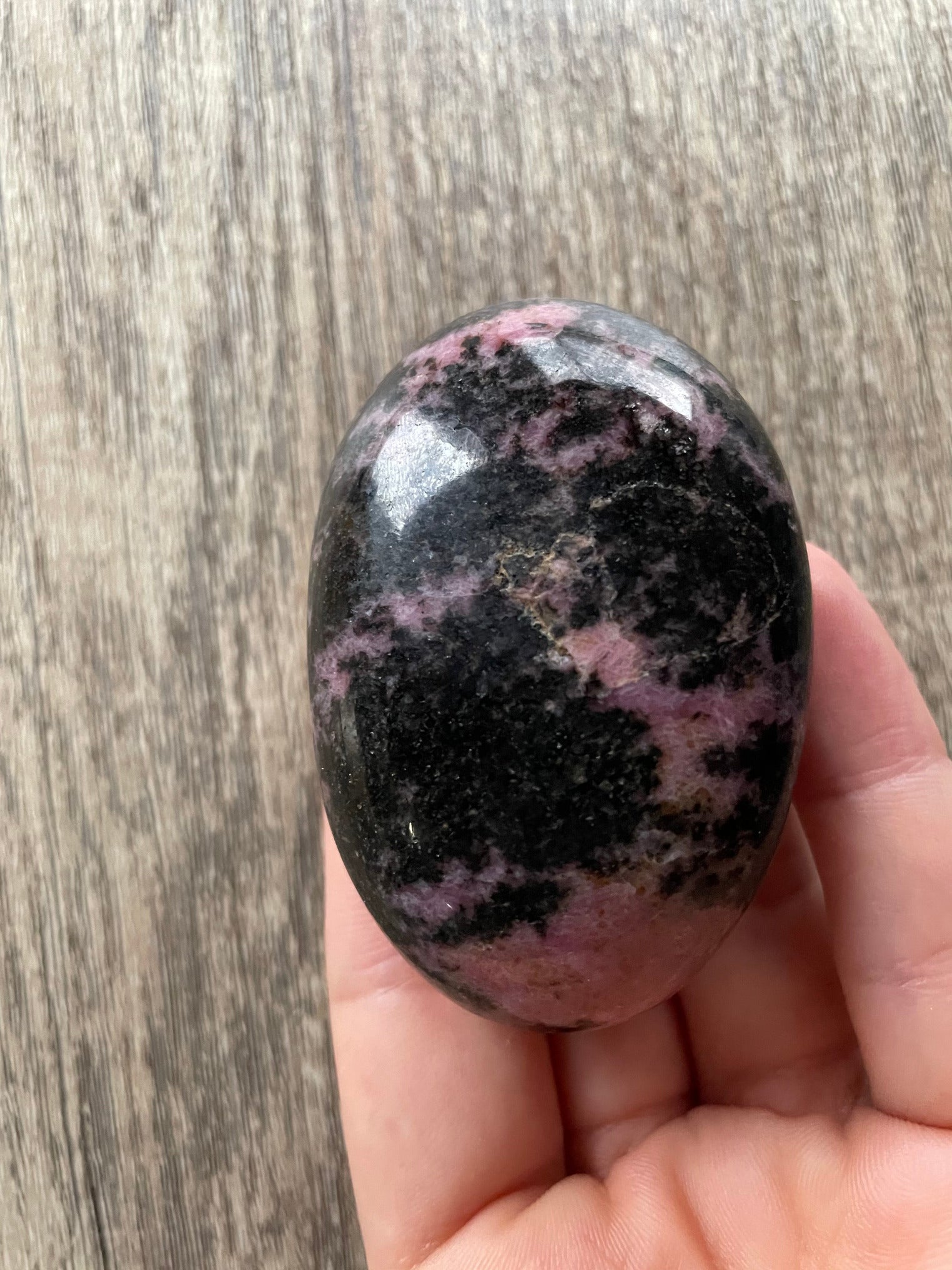 Rhodonite Palm Stone bottom