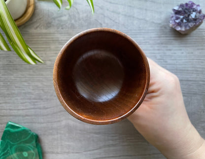 Pictured are various wood goblets with pentagrams on them.