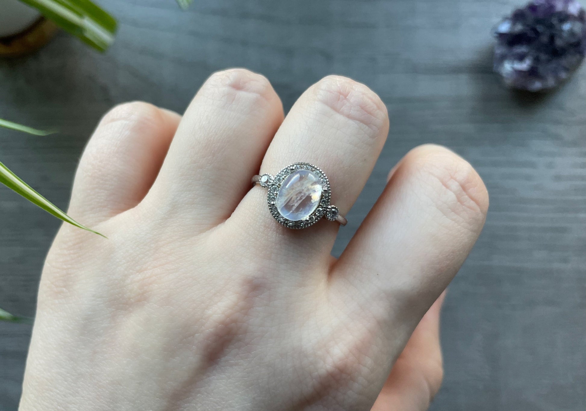 Pictured is a white moonstone gemstone set in an S925 sterling silver ring. White Moonstone S925 Sterling Silver Ring (F) - The Wandering Fox Emporium, Your Crystal Store