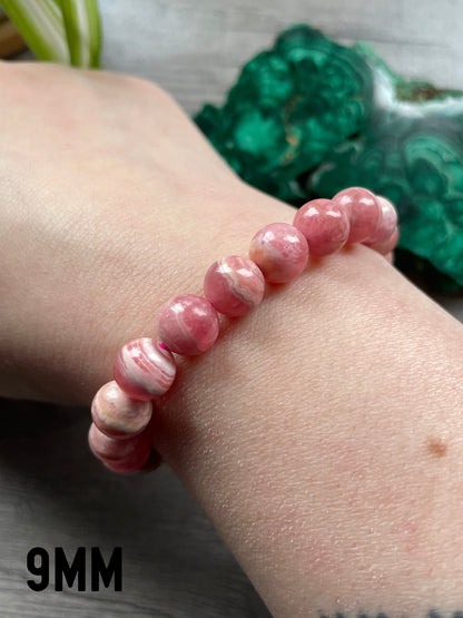 High-Quality Rhodochrosite Bracelet - The Wandering Fox Emporium, Your Crystal Store 9mm close up