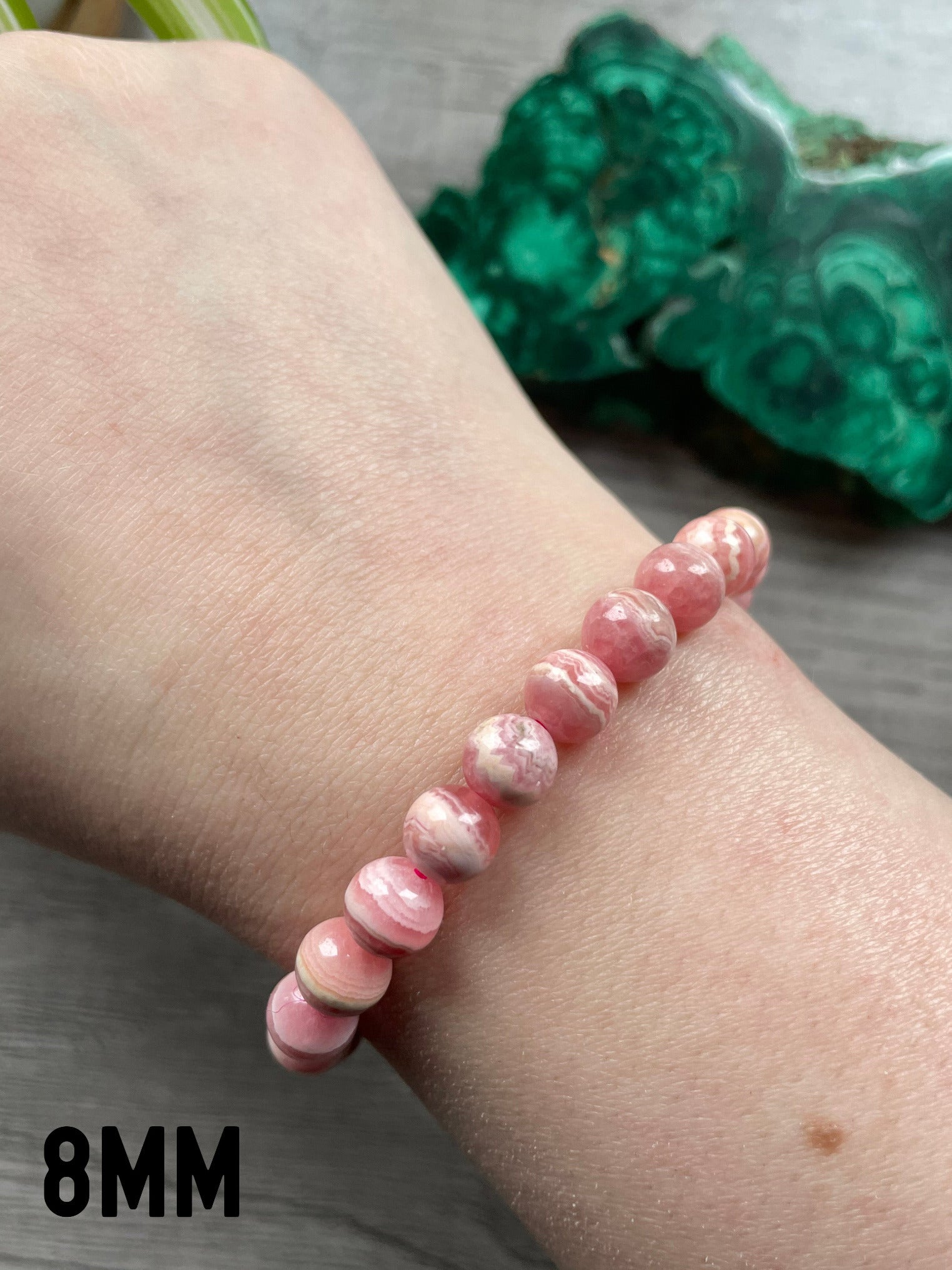 High-Quality Rhodochrosite Bracelet - The Wandering Fox Emporium, Your Crystal Store close up 8mm