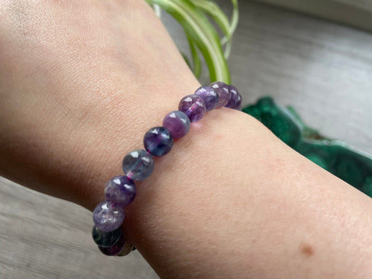 Pictured is a rainbow fluorite bead bracelet.