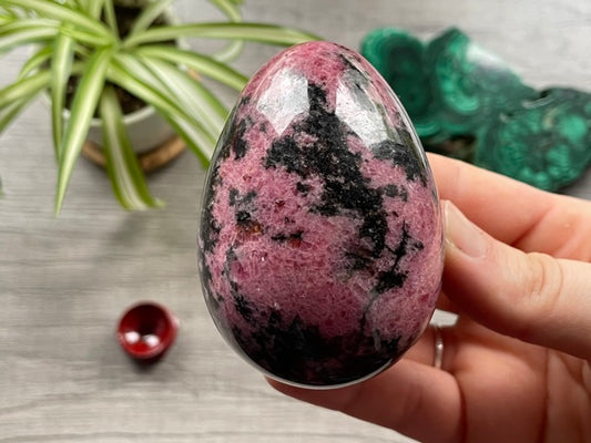 Rhodonite Egg (C) - The Wandering Fox Emporium, Your Crystal Store