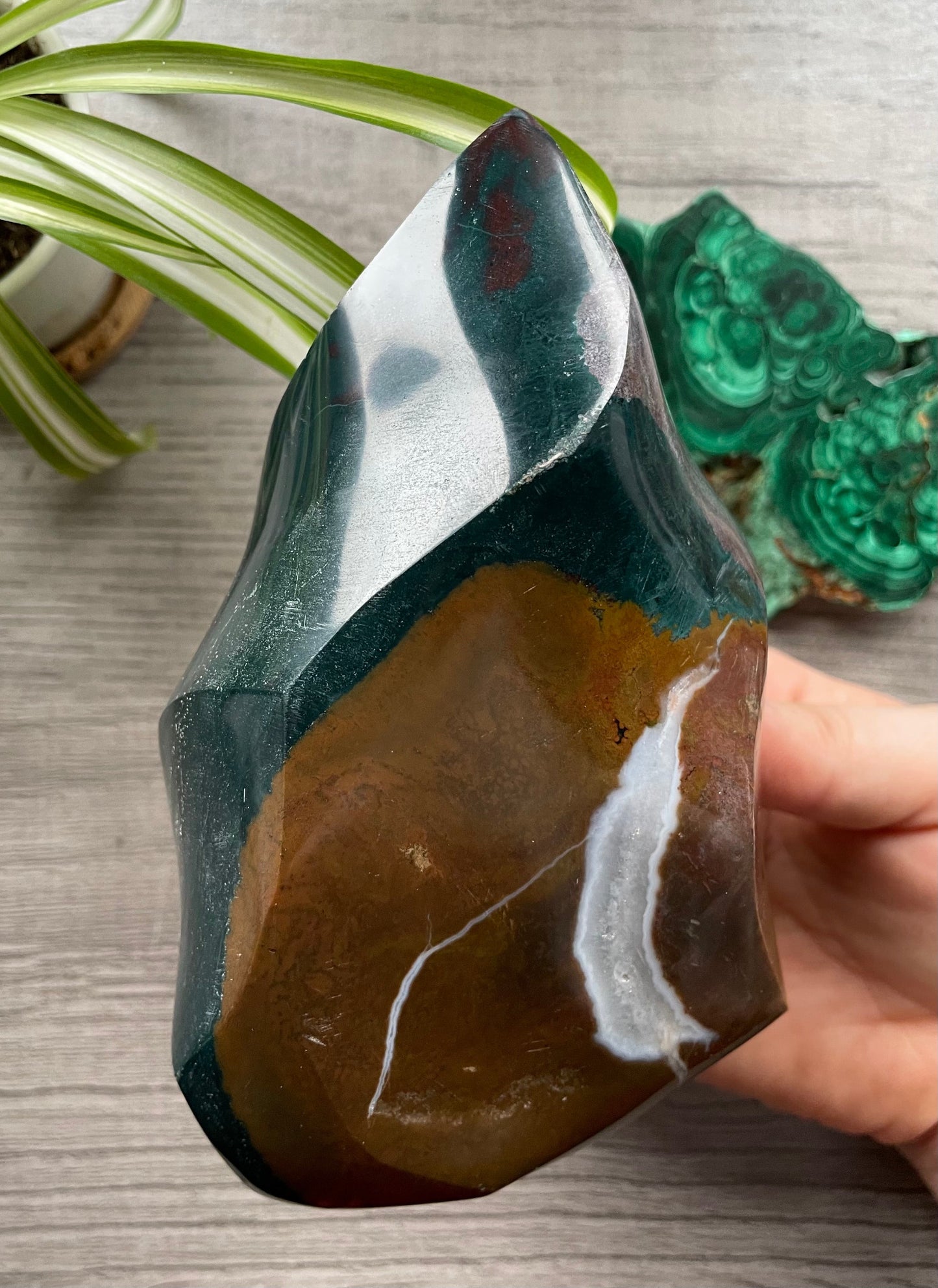 Pictured is a carved ocean jasper (river jasper) flame. Ocean Jasper Flame 1.1kg - The Wandering Fox Emporium, Your Crystal Store close up