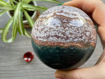 Ocean Jasper Sphere - 85mm - The Wandering Fox Emporium, Your Crystal Store side