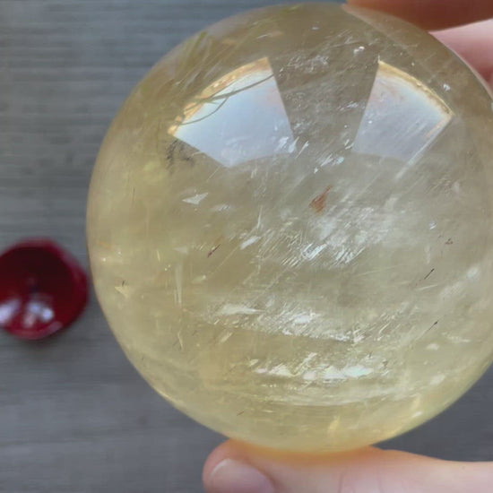 Honey Calcite Sphere - 76mm (B) - The Wandering Fox Emporium, Your Crystal Store video